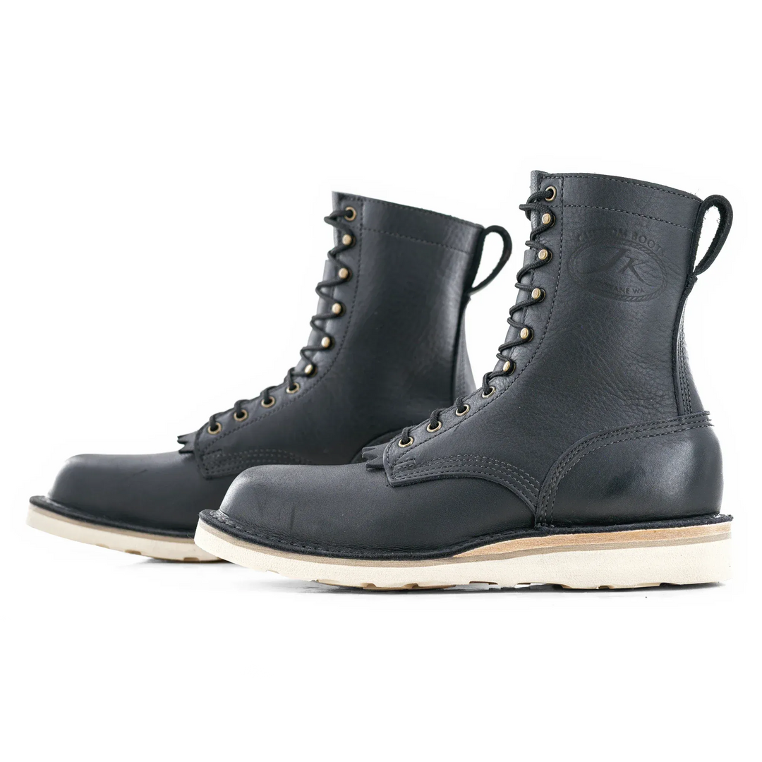 Side view of a pair of Forefront 8 inch black leather work boots on a white background