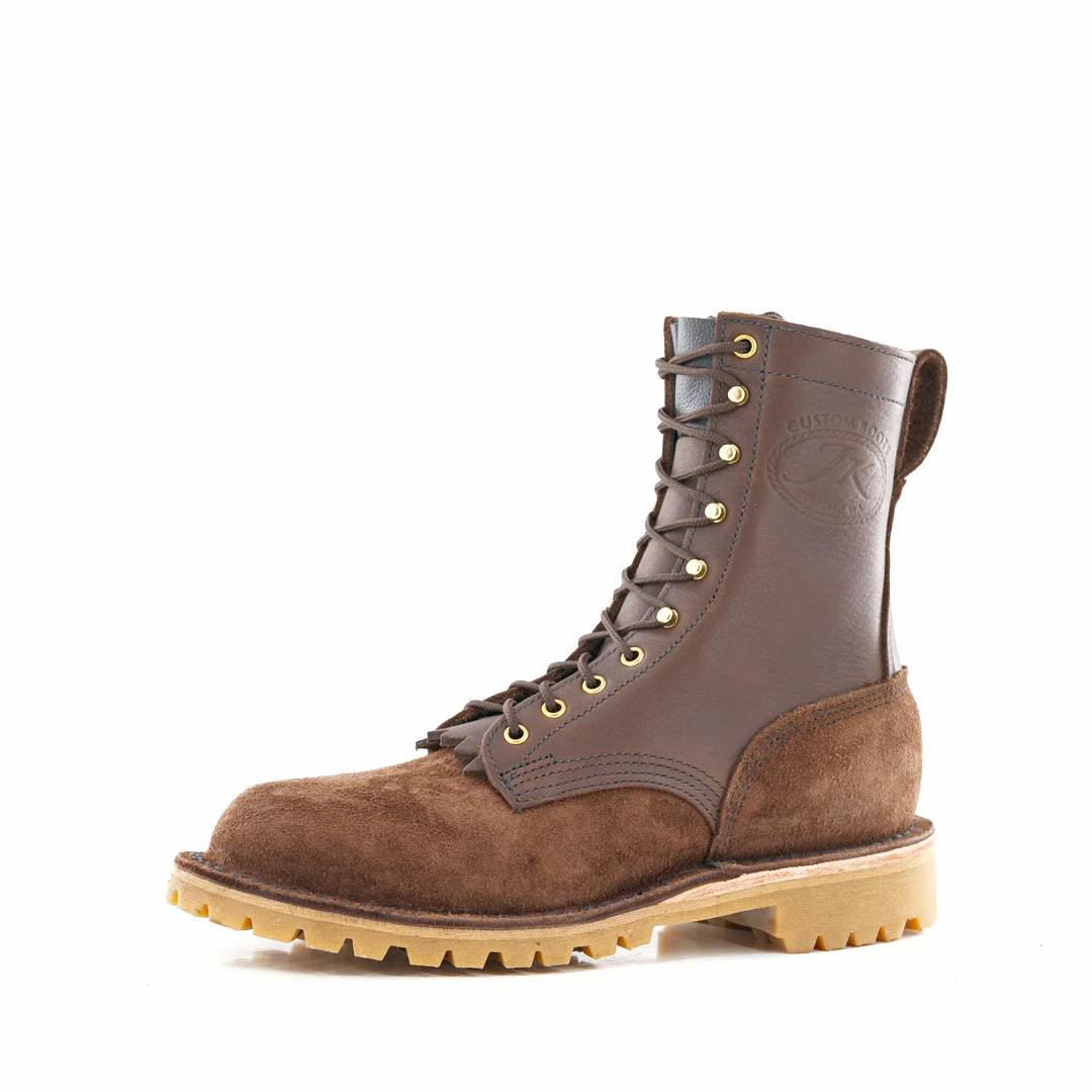 Side view of the OT Brown rough leather work boot on a white background