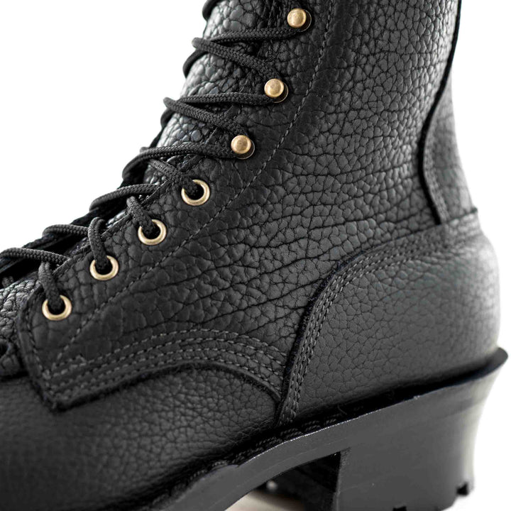 Lower quarter and counter side view of a Superduty shadow bison leather work boot