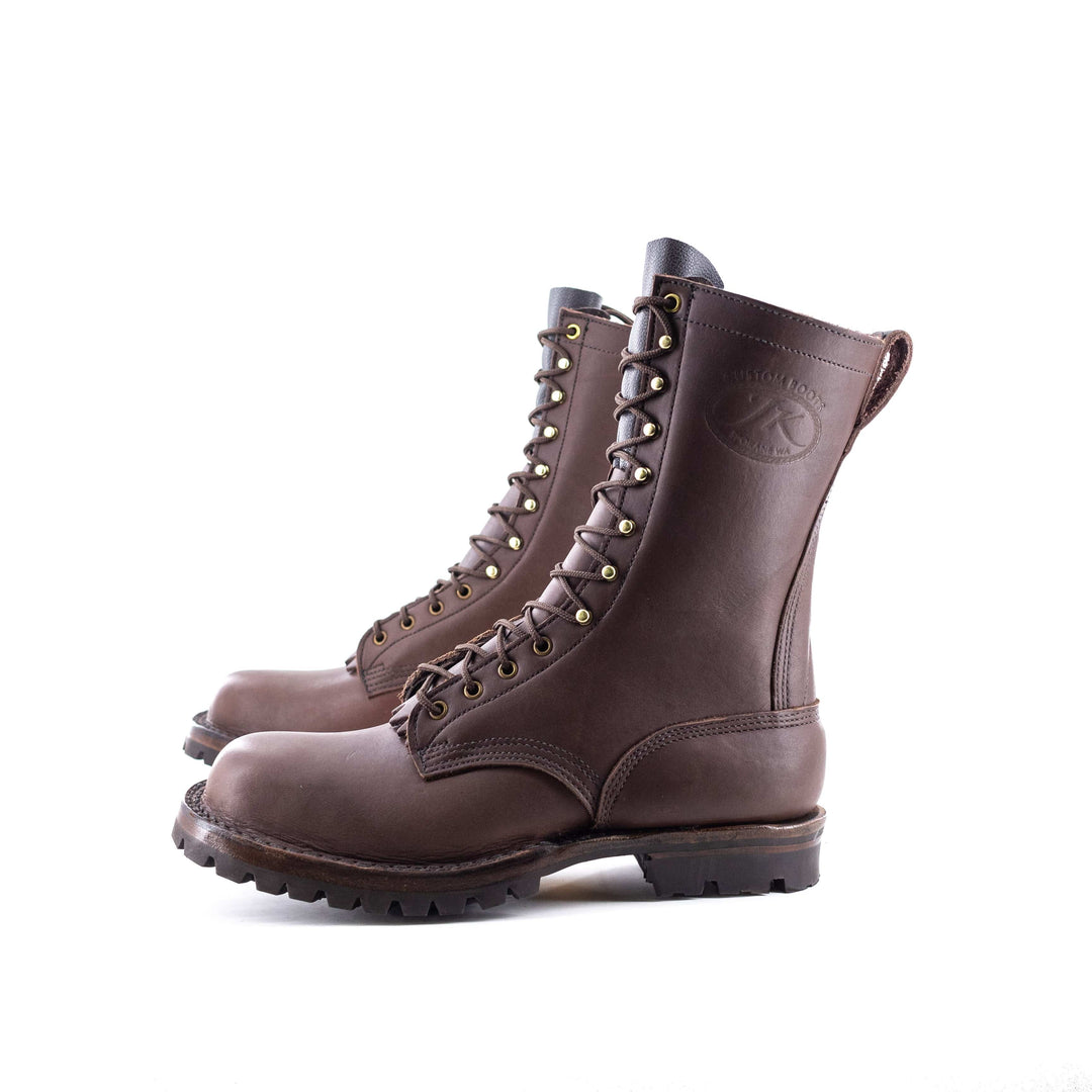 two boots sit on a white background showing a side profile.