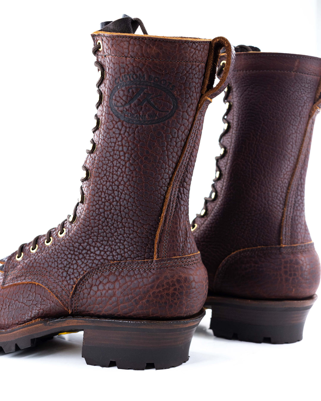 Side quarter view of a pair of Superduty Bison leather work boots