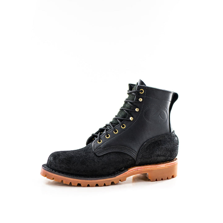 Side view of the OT 6 inch black leather work boot on a white background